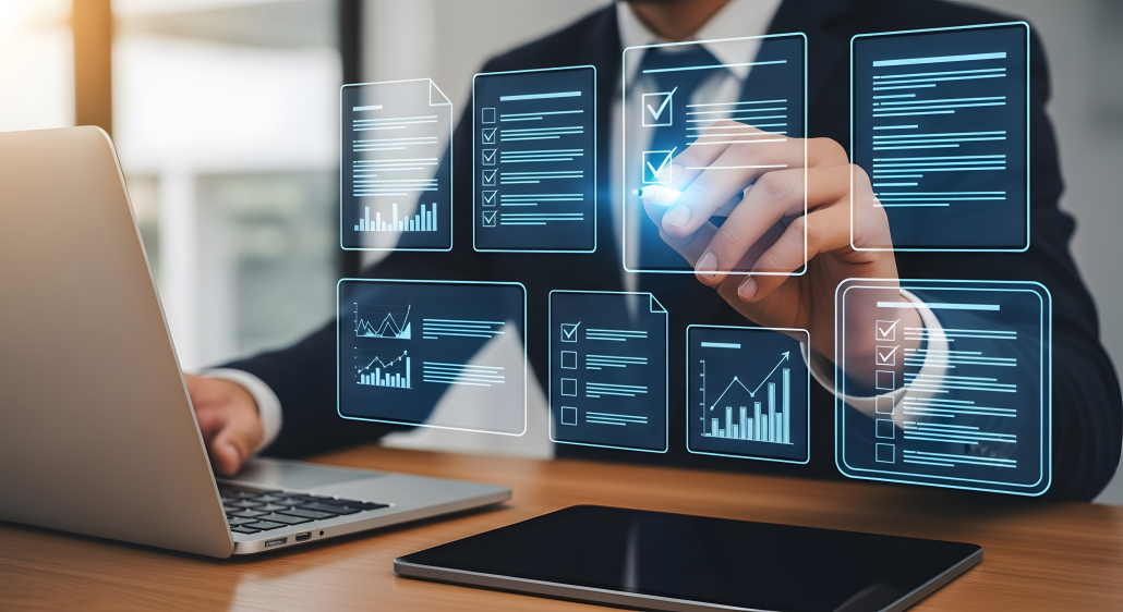 Man analyzes data with holographic interfaces on his laptop representing business intelligence for data driven decisions, insights and strategy.